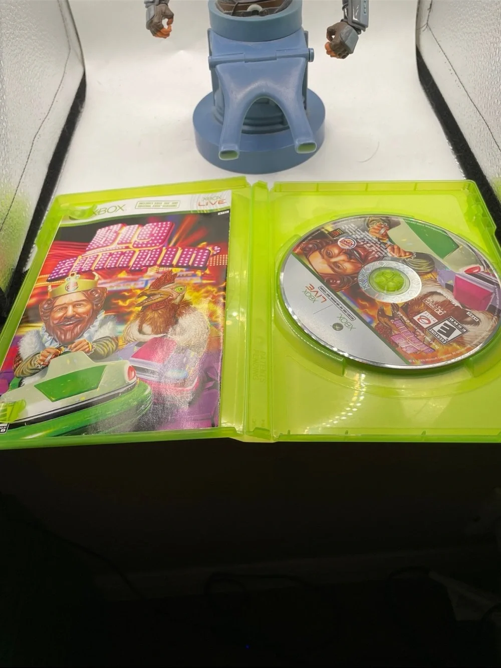 Microsoft Xbox Game with Neon Green Case and Pink Cover Art